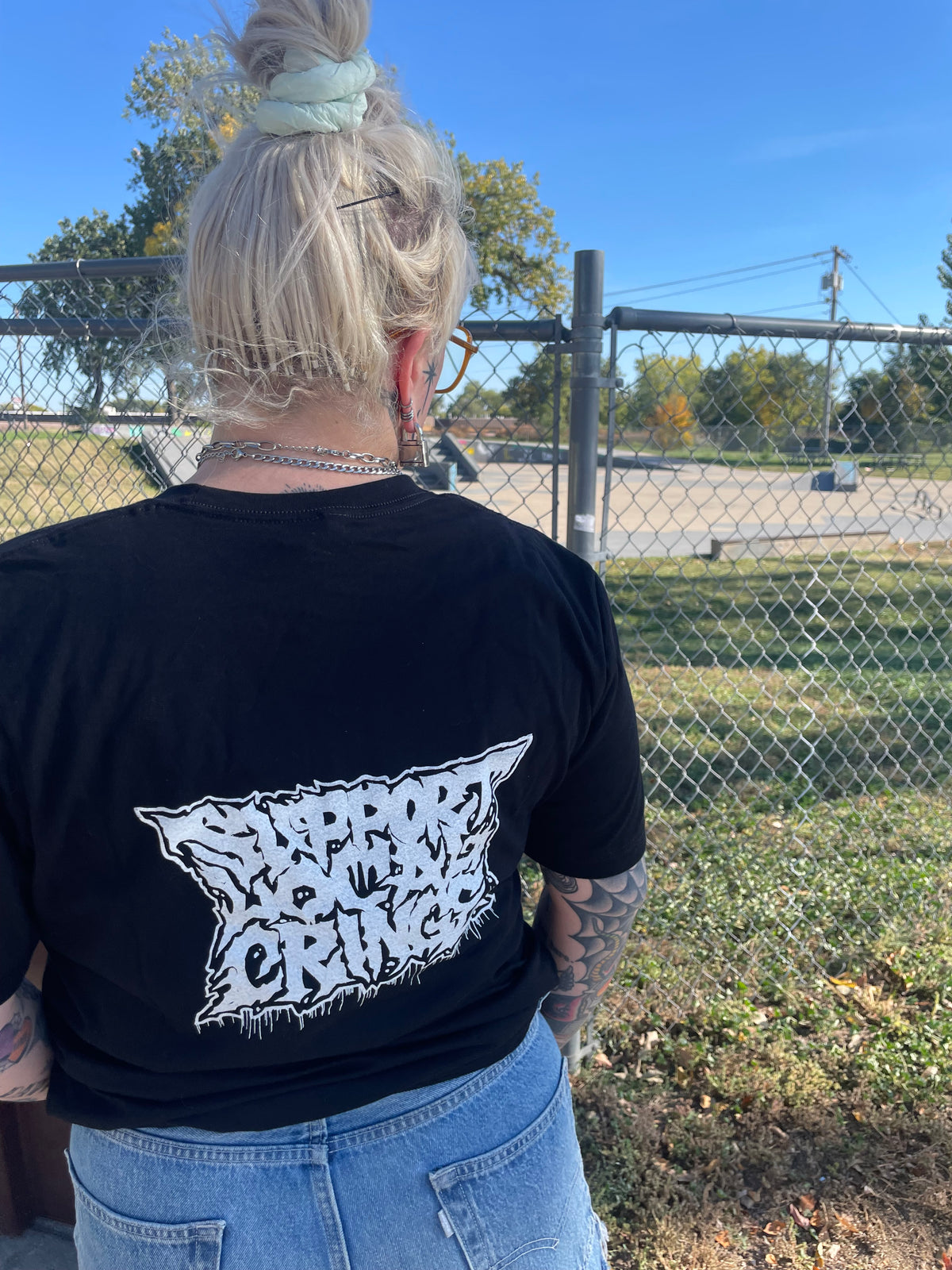 Writing on the wall T shirt