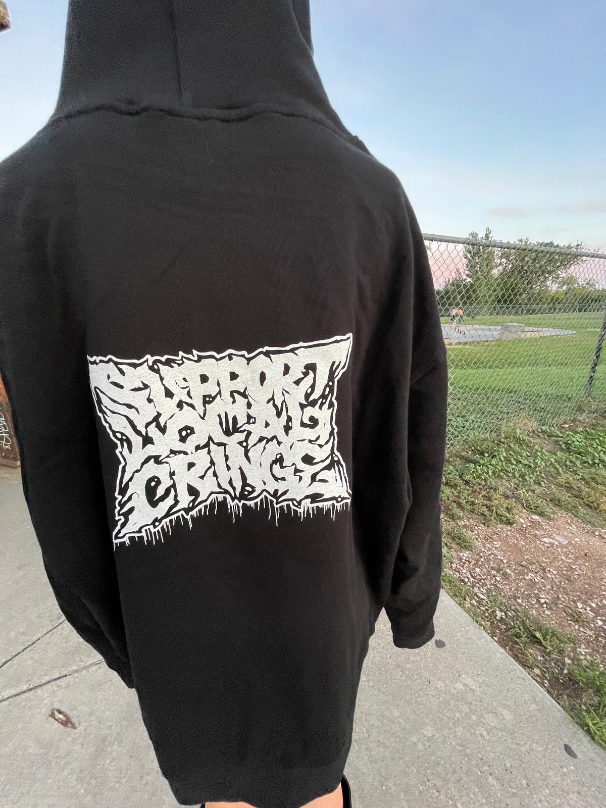 Writing on the wall hoodie (only 1)