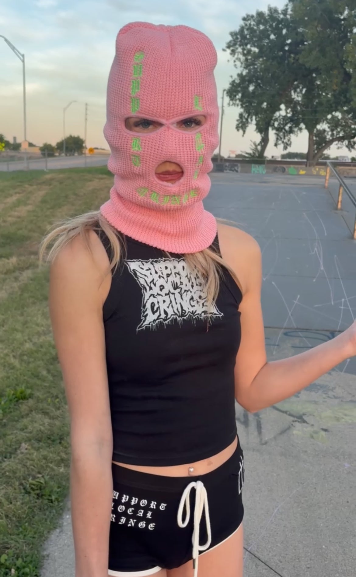Writing on the wall tank top